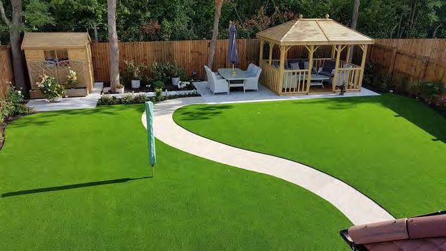 Lush synthetic grass lawn installation in Florida residential yard
