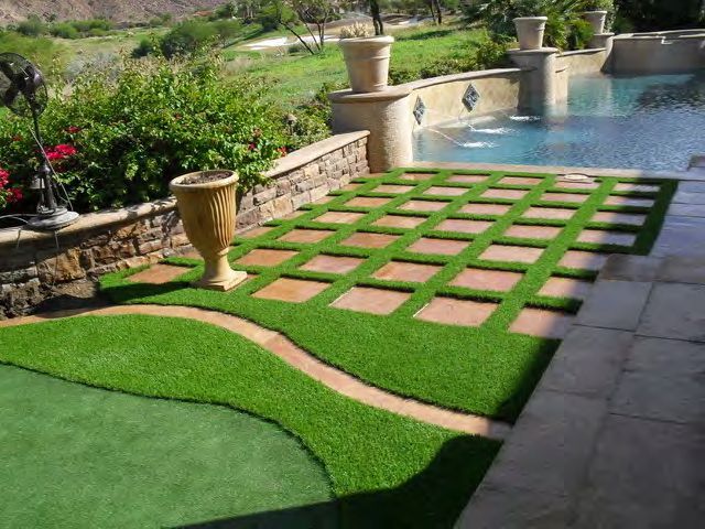 Artificial turf play area safe for children in backyard