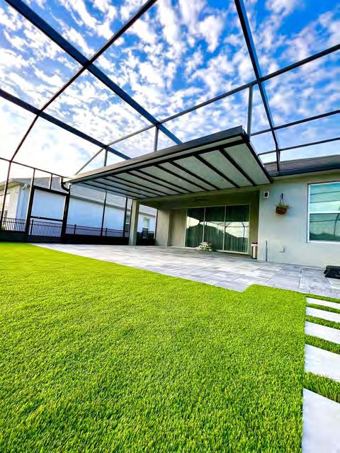 Artificial turf front yard replacing natural grass for water conservation
