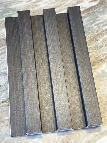 Decorative panel close-up showing wood grain texture detail