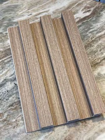 Decorative panels enhancing outdoor kitchen and pergola area