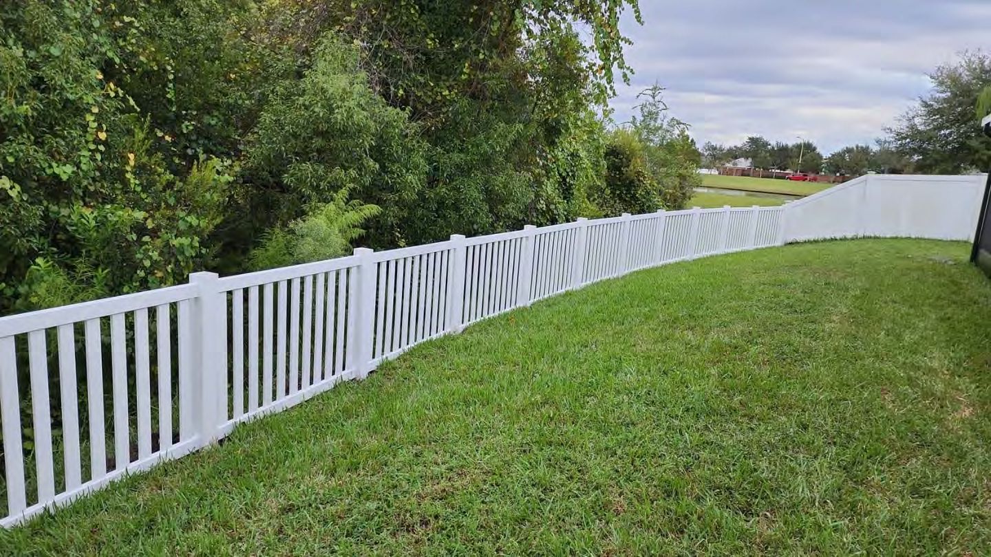 Aluminum fence with arched gate for elegant entrance
