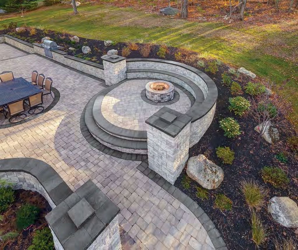 Custom built fire pit with seating area for outdoor entertaining