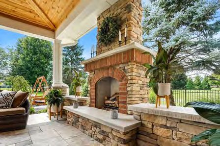 Brick outdoor fireplace with rustic design and chimney