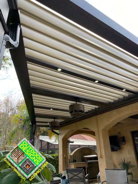 Powder coated louvered pergola with built-in gutter system