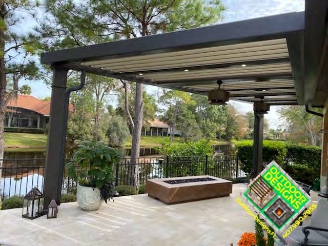 Remote-controlled louver blades open for sunlight on patio