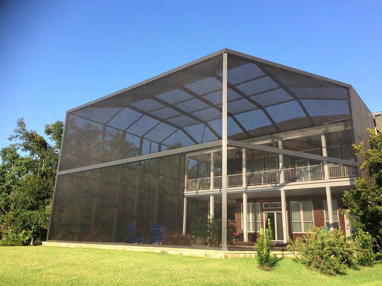 Panoramic open view screen enclosure over pool and patio area