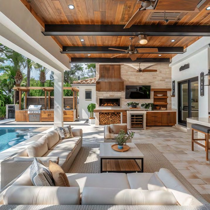 L-shaped outdoor kitchen with granite countertops and storage cabinets
