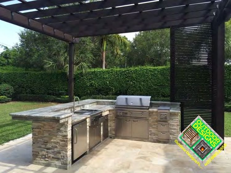 Outdoor kitchen bar area with seating for entertaining guests