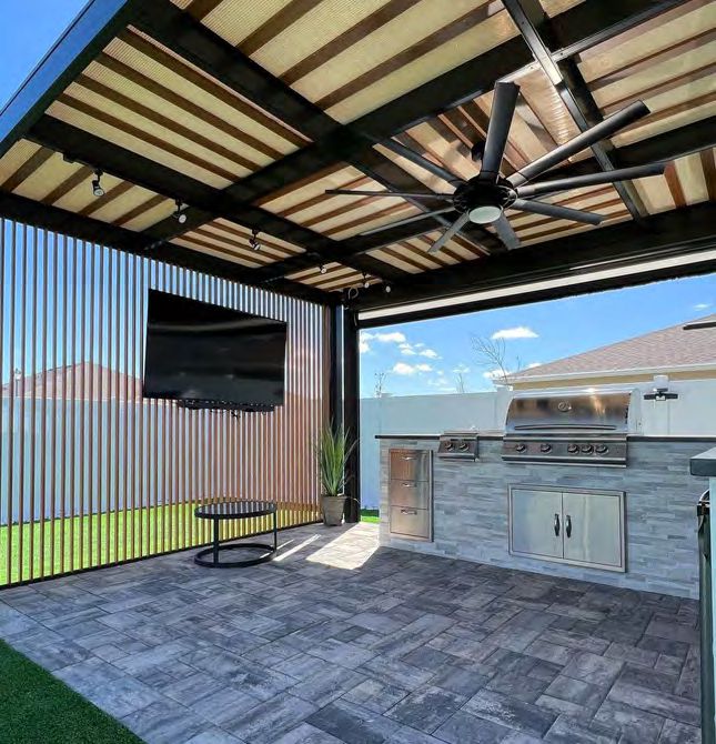 Outdoor kitchen project with integrated fire pit and seating