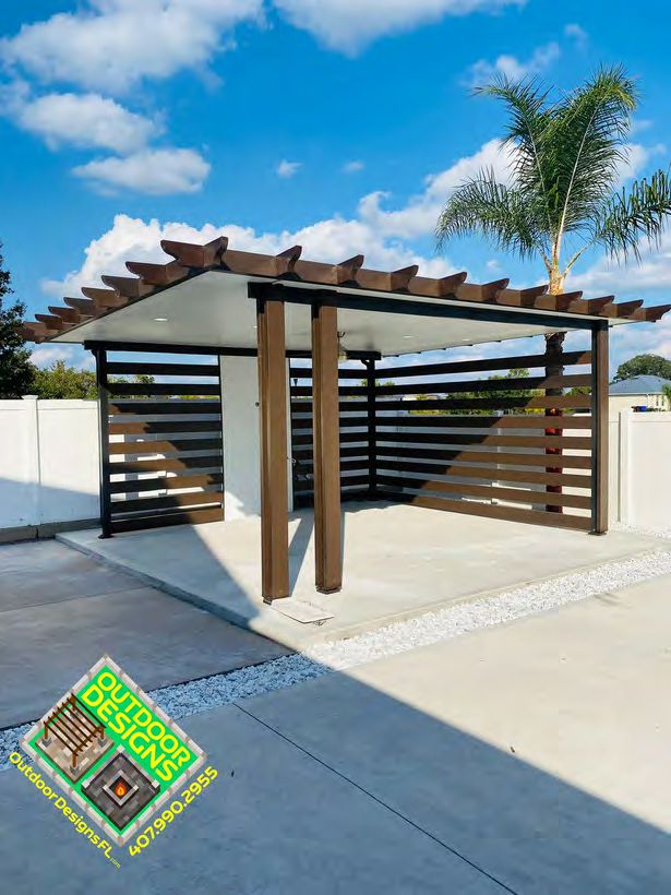 Full outdoor kitchen setup with multiple cooking and prep stations