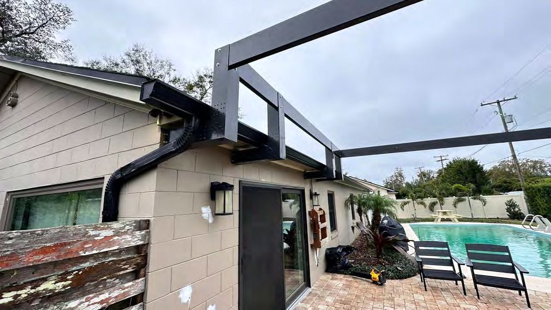 Custom insulated aluminum pergola installed in Florida backyard