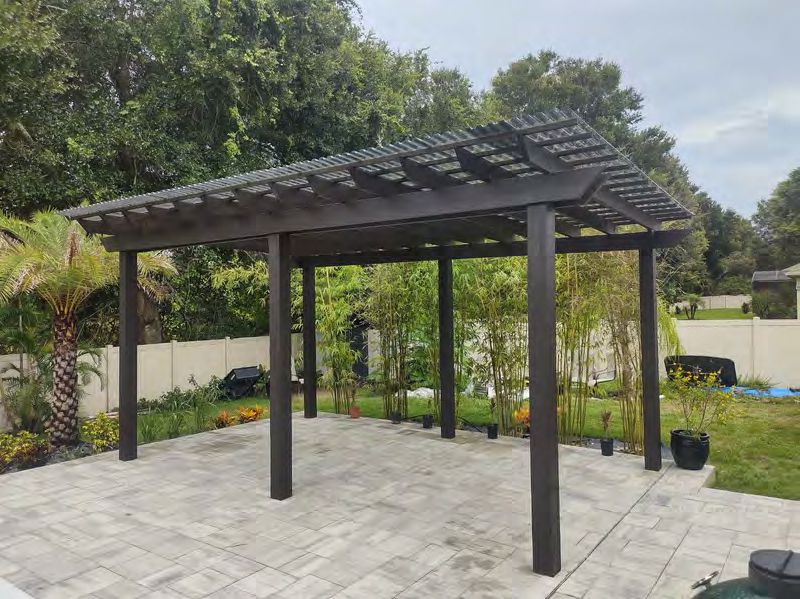 Pergola with shade slats providing partial sun coverage