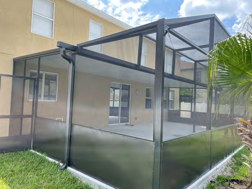 Screen enclosure with aluminum frame construction for durability