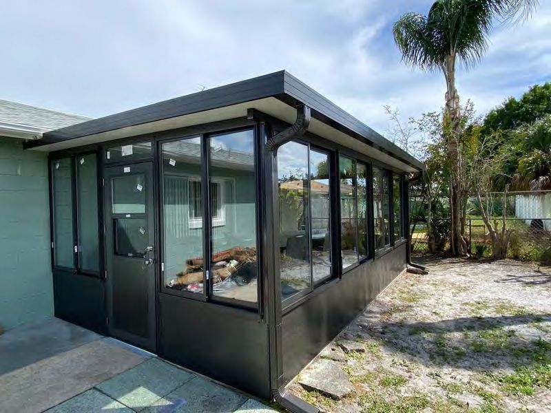 Sunroom interior with natural light and impact-resistant laminated glass
